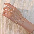 Turn Every Hand Movement Into Pure Elegance ( Pearl Cascade Hand Chain Bracelet )