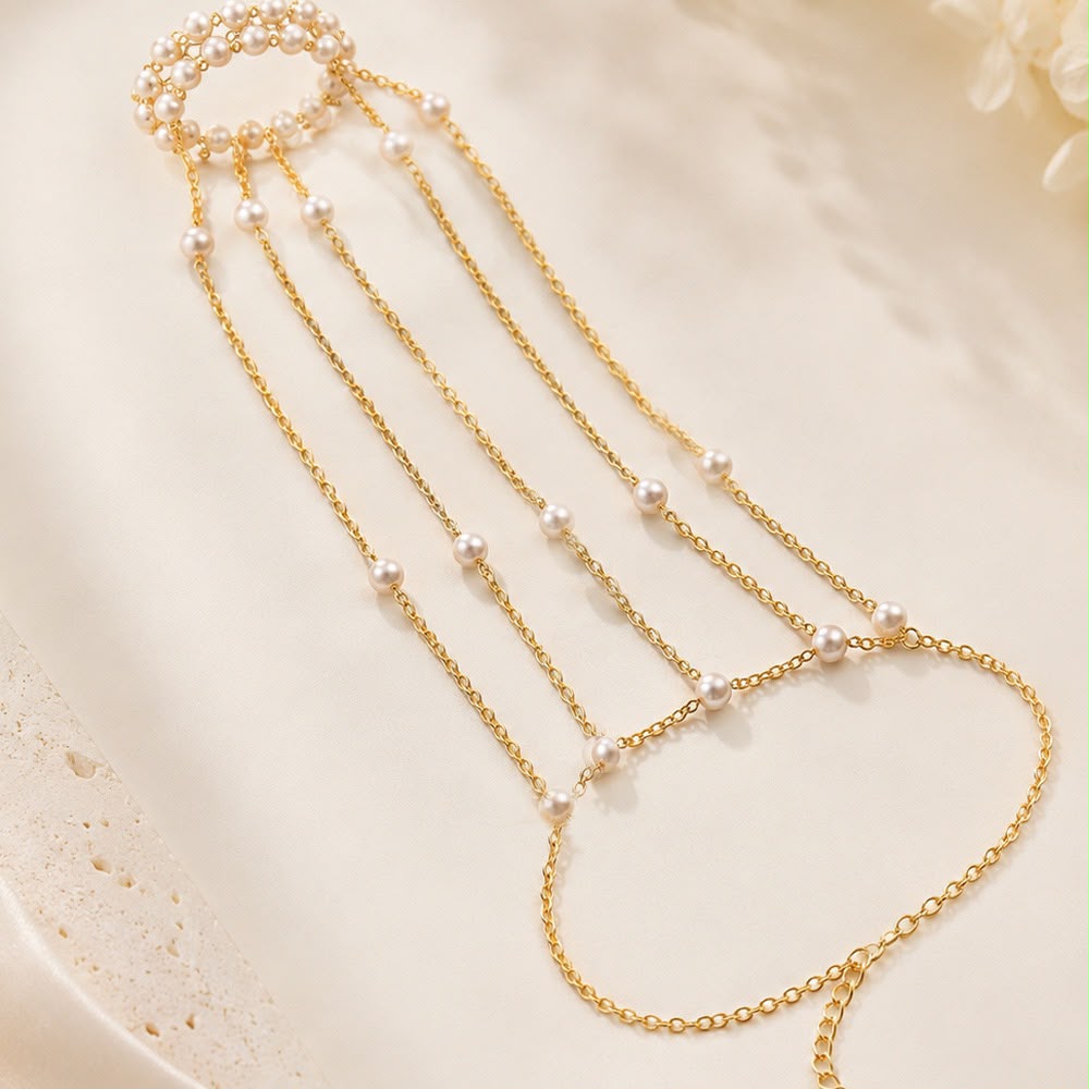 Turn Every Hand Movement Into Pure Elegance ( Pearl Cascade Hand Chain Bracelet )